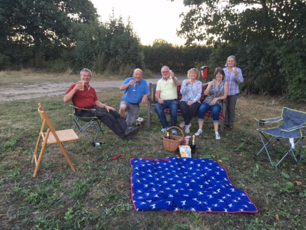 People sitting down and having a drink