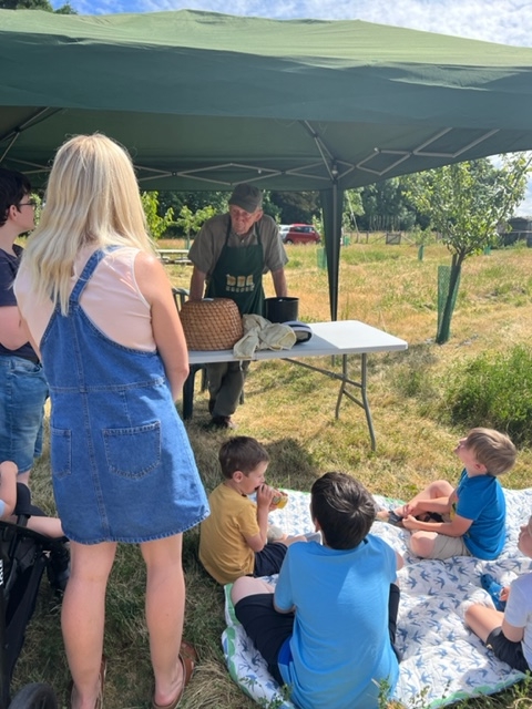 A group learning about beekeeping