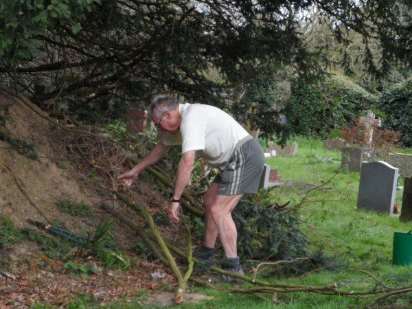 Man clearing rubbish